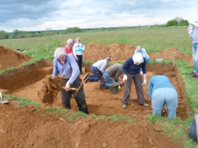 Volunteers digging